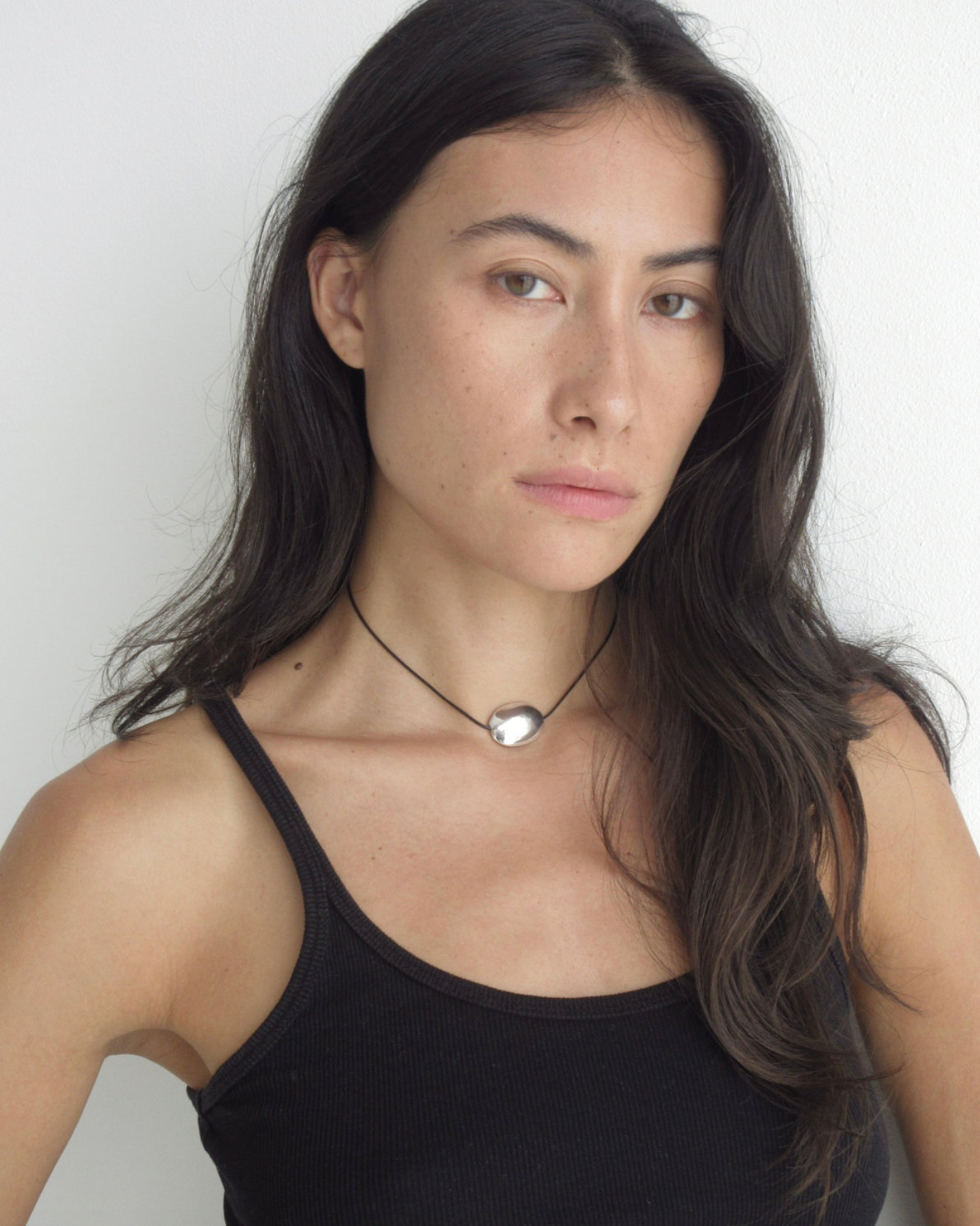 Small silver oval cord necklace